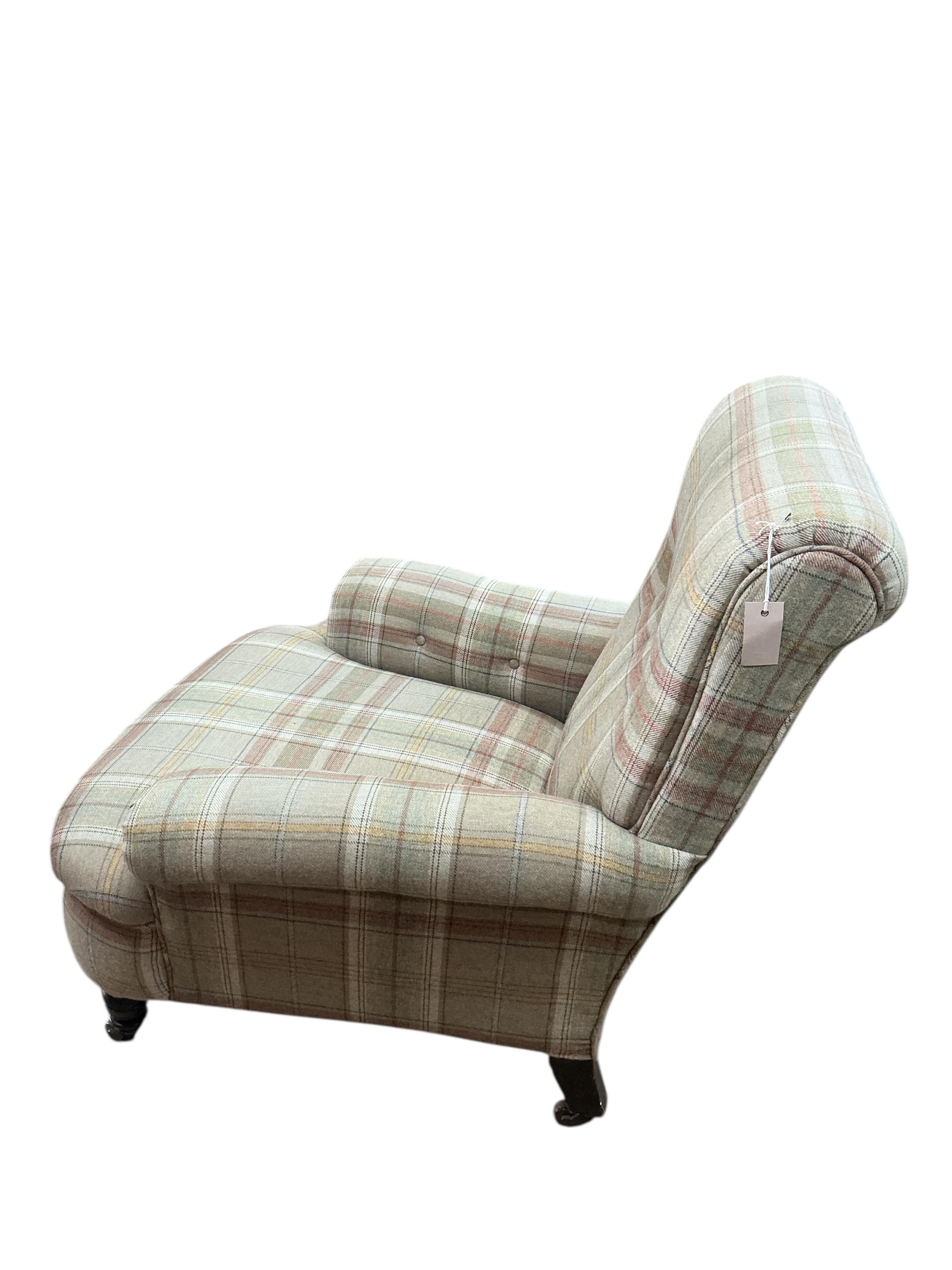 A Victorian armchair upholstered in a tartan wool fabric, width 84cm, depth 84cm, height 88cm